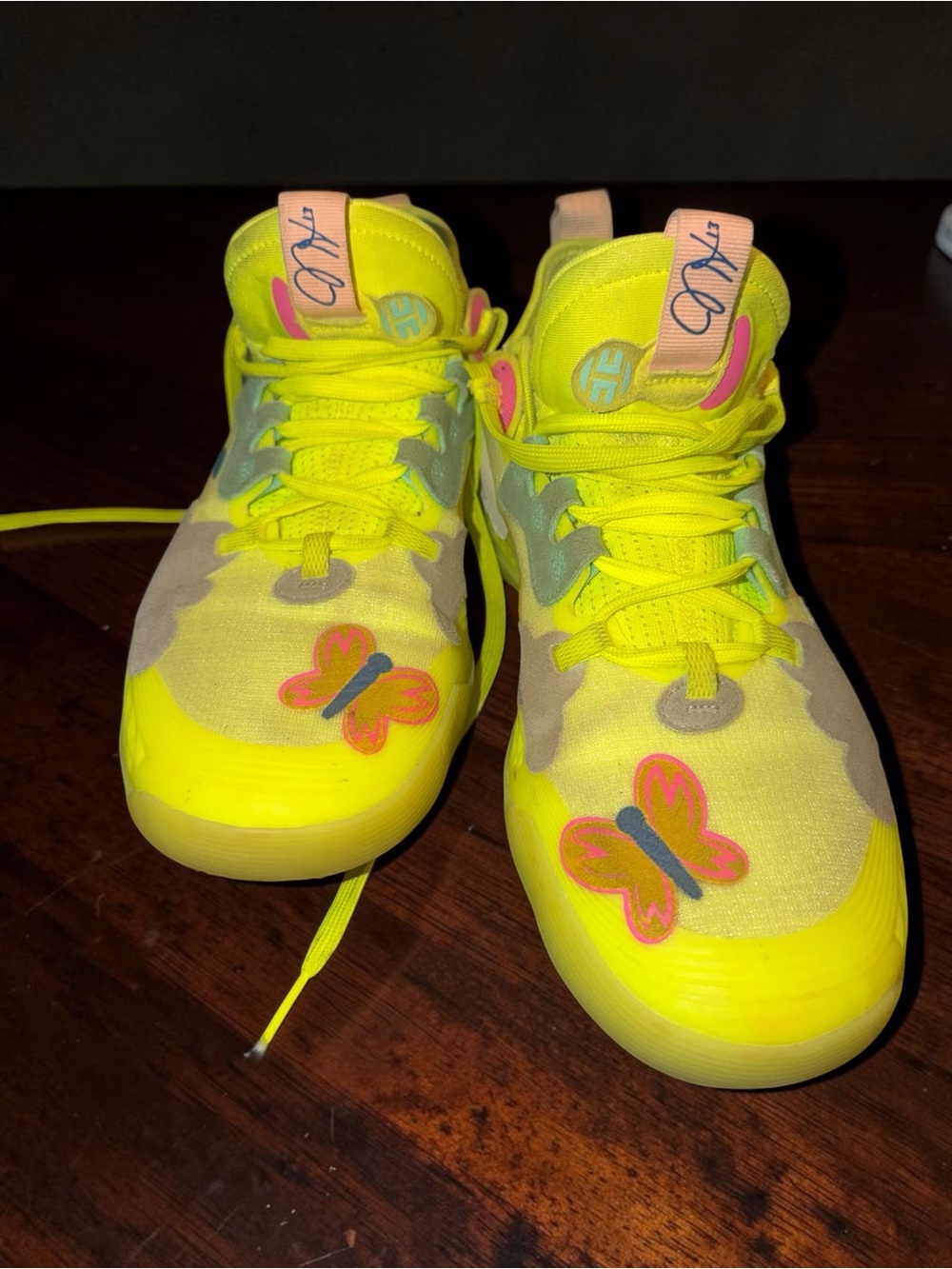 Neon Yellow Basketball Shoes with Butterfly Accent